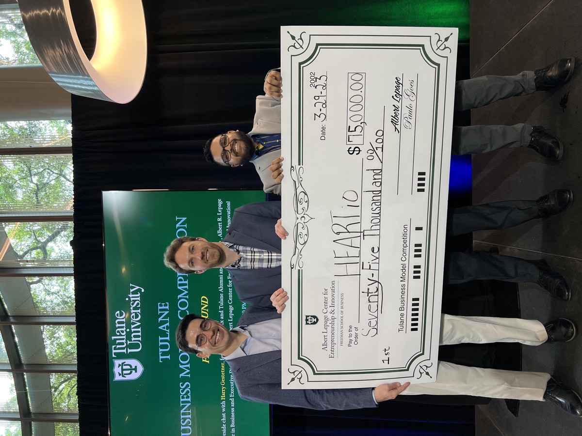 HEARTio cofounders holding a $75,000 first place check at the Tulane Business Model Competition